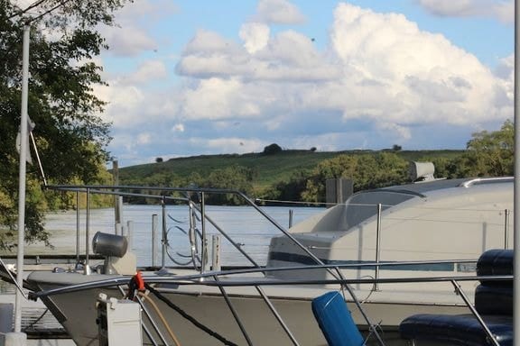 Boats docked at pier